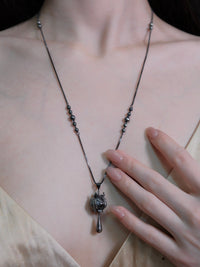 CHENG Black Silver Sculpted Drop Pod Necklace | MADA IN CHINA