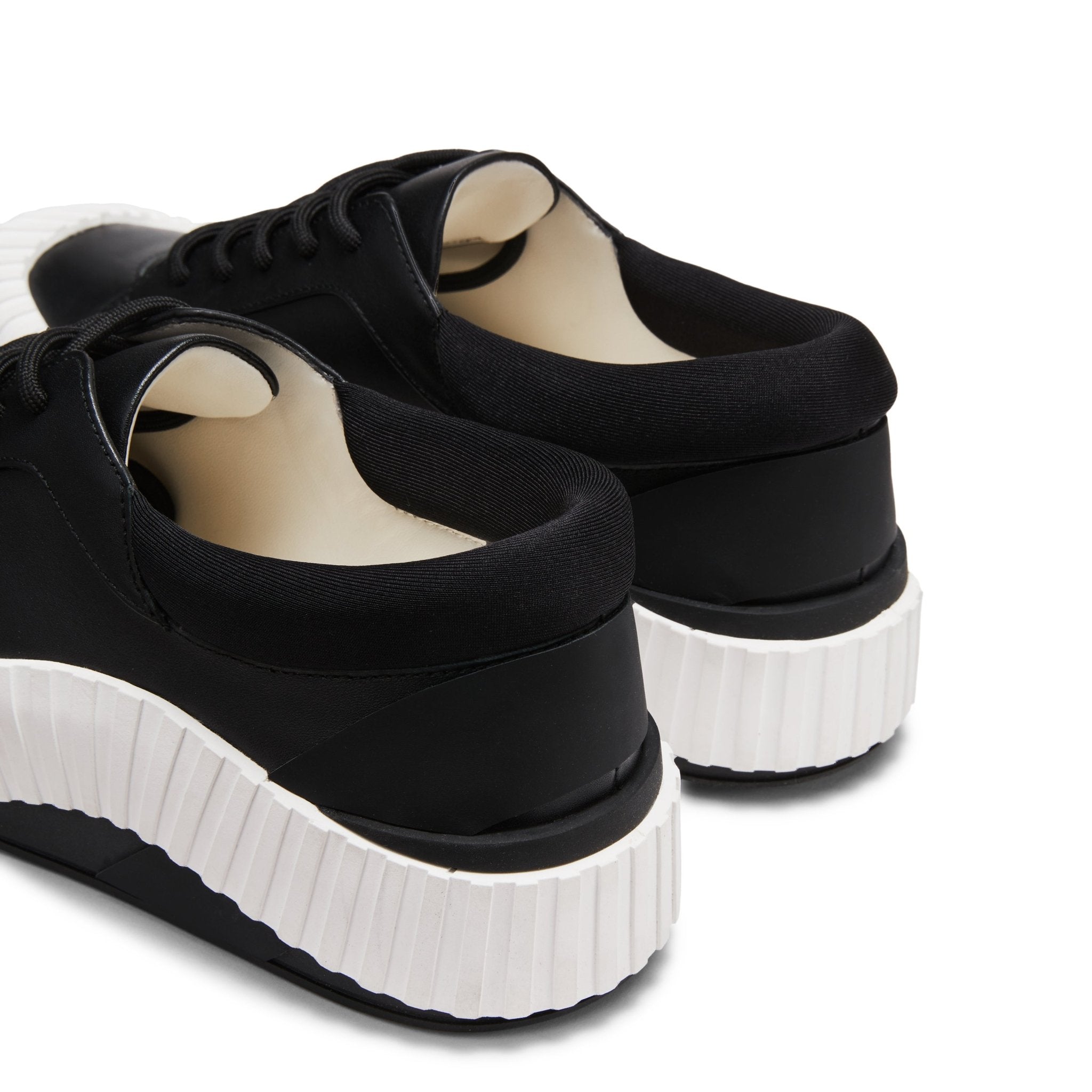 LOST IN ECHO Irregular Wavy Edge Thick-soled Casual Shoes in Black | MADA IN CHINA
