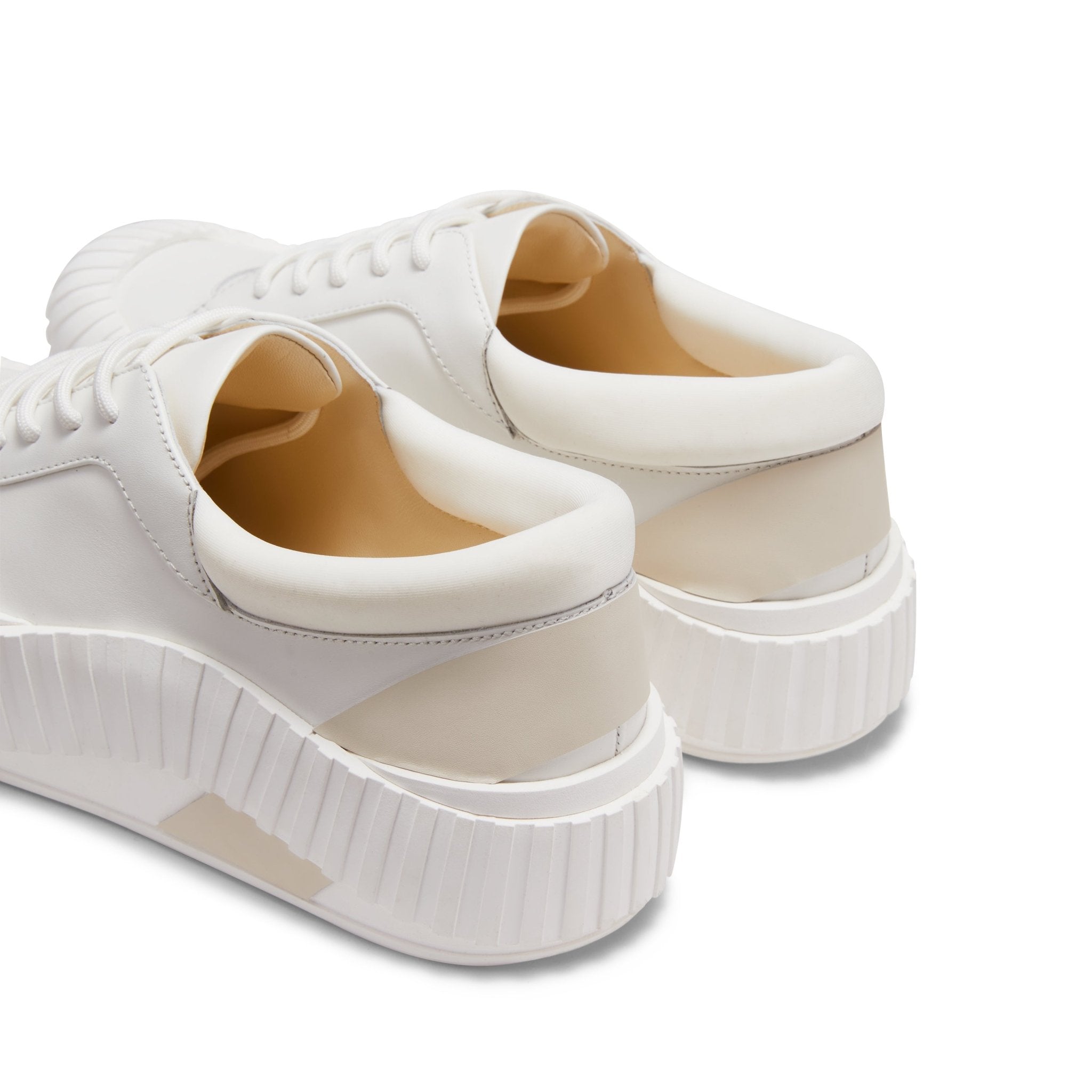 LOST IN ECHO Irregular Wavy Edge Thick-soled Casual Shoes in White | MADA IN CHINA