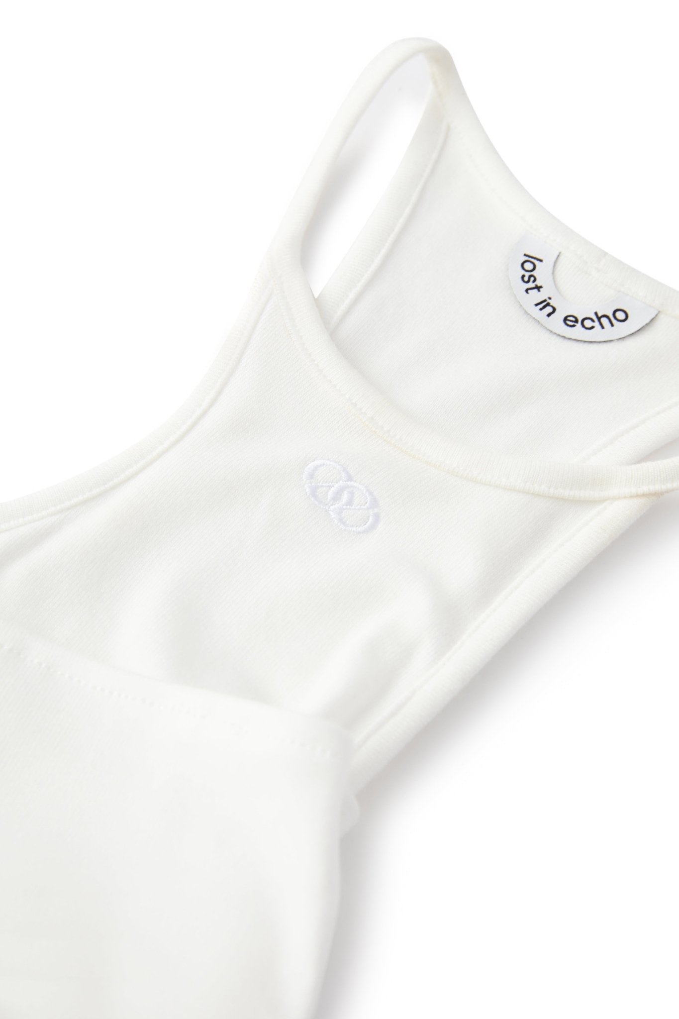 LOST IN ECHO Twisted Racerback Tank Top in White | MADA IN CHINA