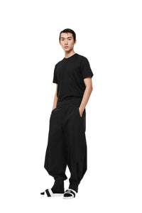 UNAWARES Black Pleated Tapered Zip Slit Trousers | MADA IN CHINA
