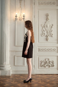 ARTE PURA Black Sleeveless Jumper Skirt With White Bow Tie | MADA IN CHINA